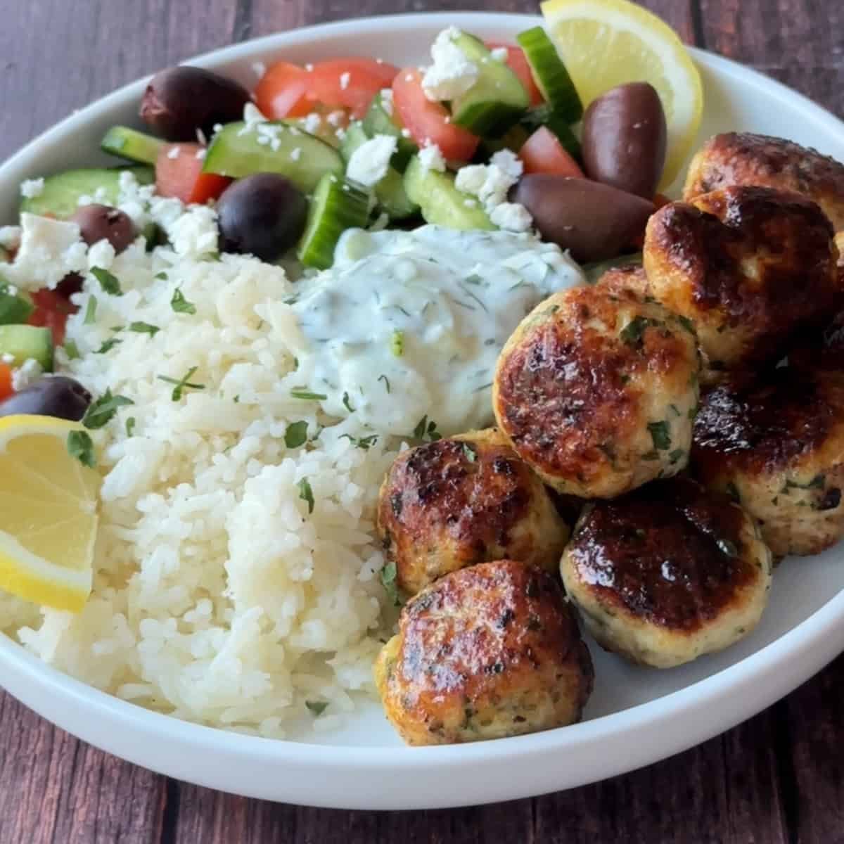 https://www.unicornsinthekitchen.com/wp-content/uploads/2025/02/Greek-Chicken-Meatballs-Step-15.jpg